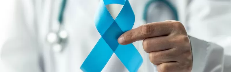 Doctor Holding A Ribbon