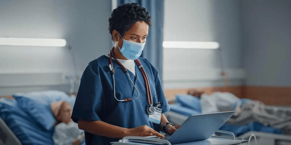 Nurse Using A Laptop