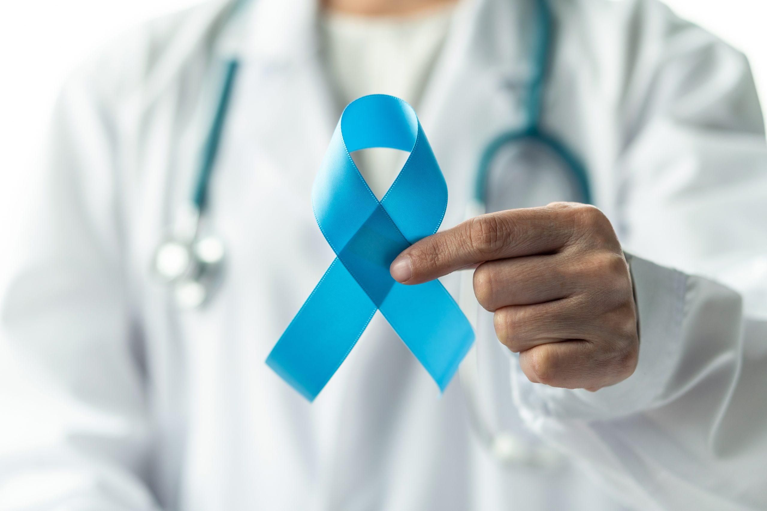 Doctor Holding A Ribbon