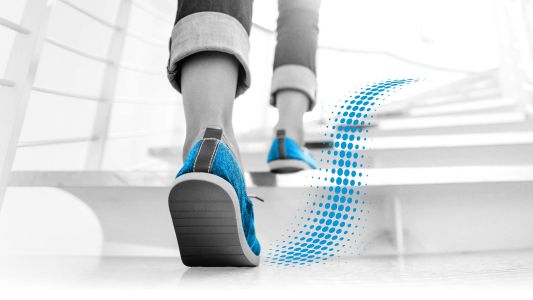 close up of activated patient feet climing stairs