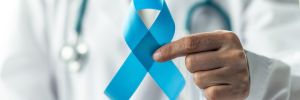 Doctor Holding A Ribbon
